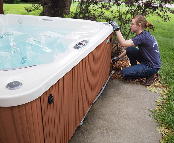 McElroy Electric electrician completes the outdoor conduit, wiring and connections necessary for a hot tub.