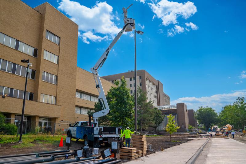 McElroy Electric utilizes thier bucket truck to install new street lights at the University of Kansas.