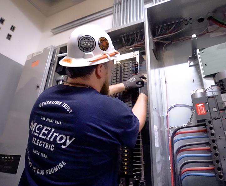 McElroy Electric electrician installs a service entrance panel.