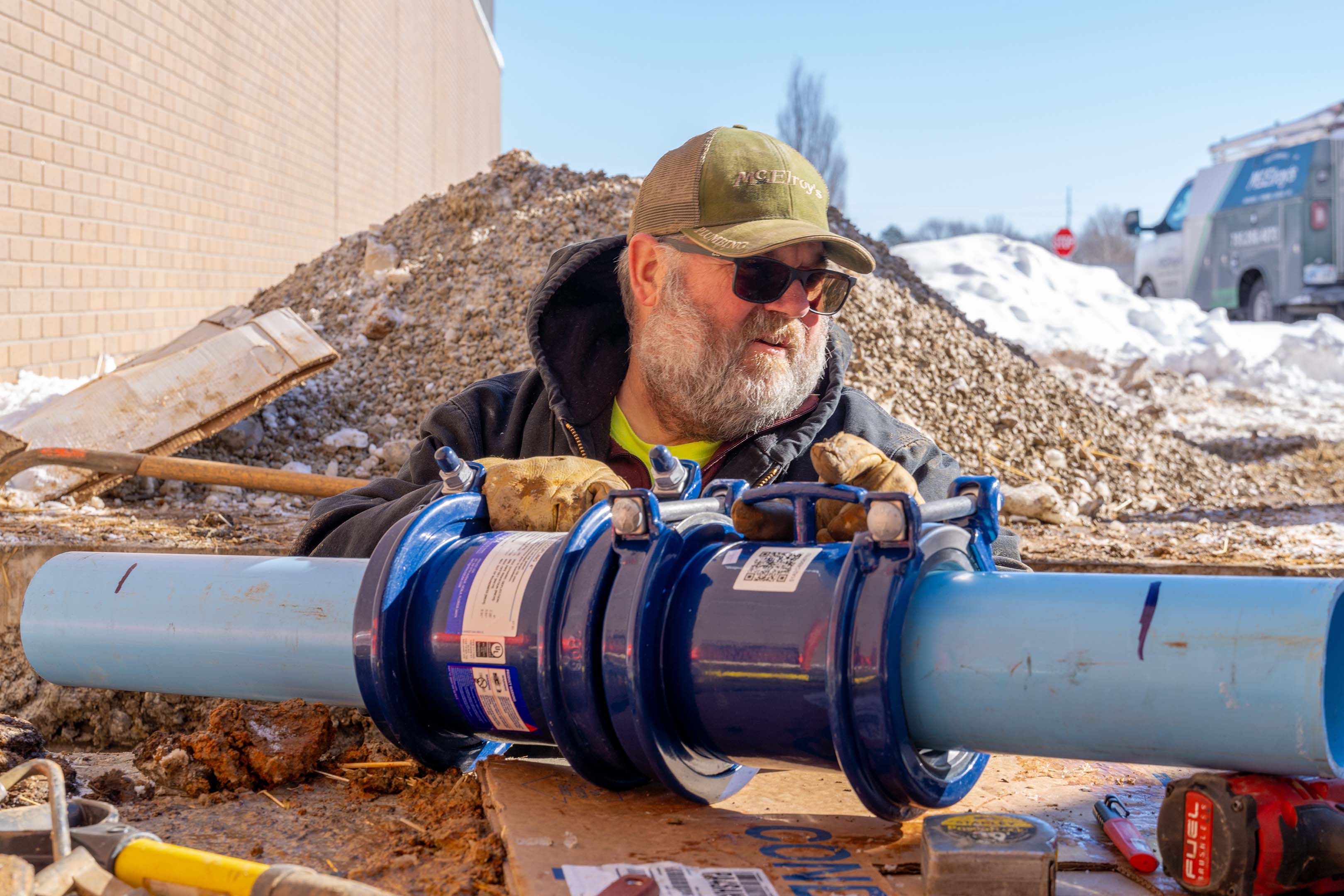 While working as a McElroy’s plumber, Shawn O’Malley replaced a burst water main at Shawnee Heights High School.